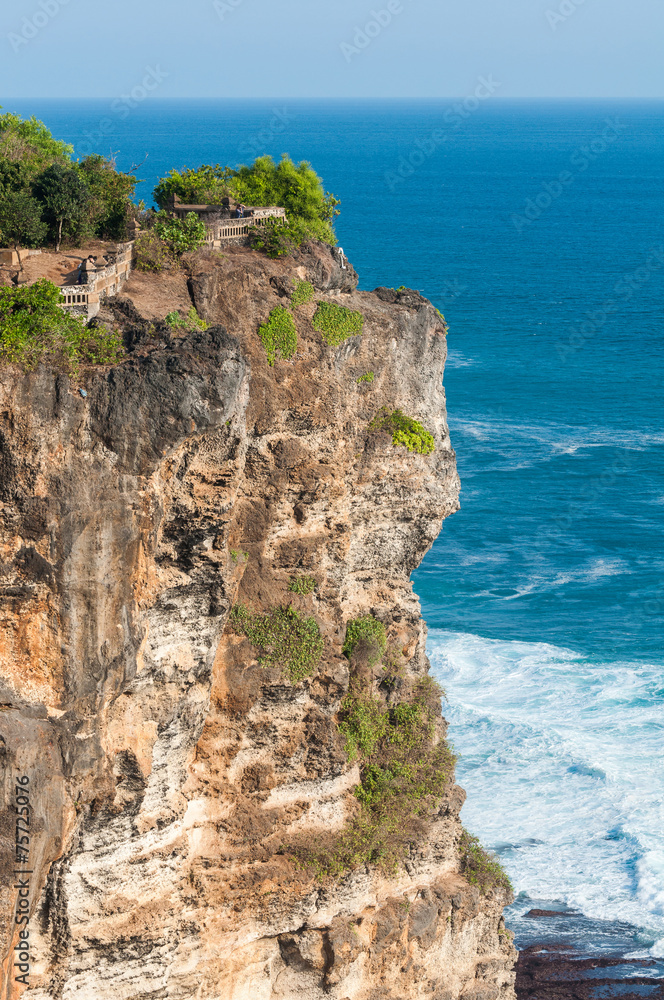 Rocky beach near Ulawatu temple on Bali, Indonesia Rocky beach near Ulawatu temple on Bali, Indonesia