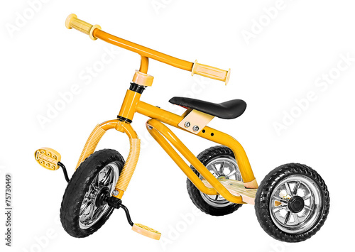 Kids yellow tricycle photo