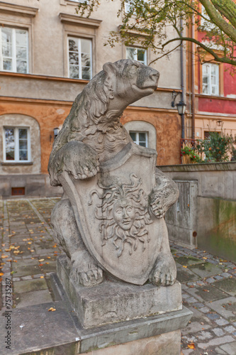 Sculpture of a bear with a shield. Warsaw, Poland