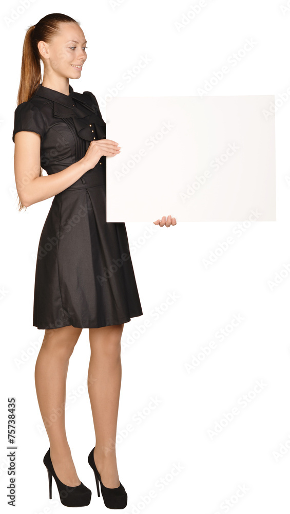 business woman holding a blank white board. business woman holding a blank white board.