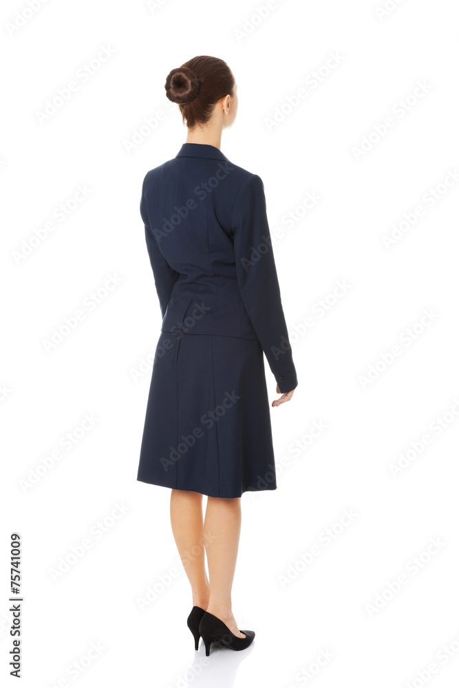 Businesswoman standing back Businesswoman standing back