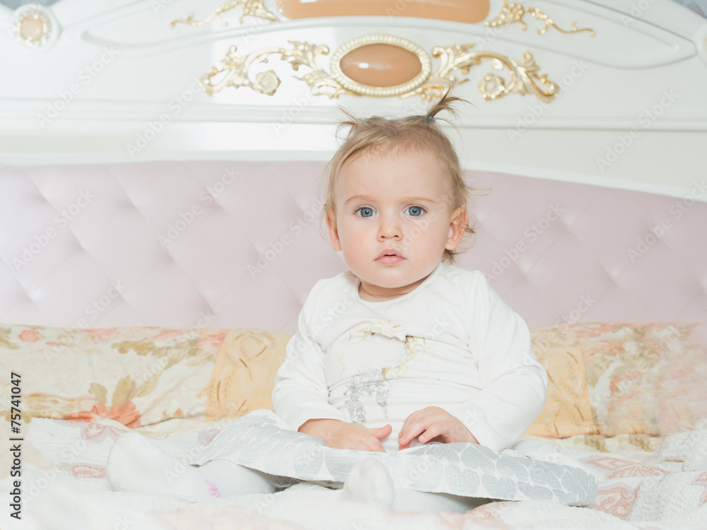Happy caucasian family mother and daughter on the bed at home Happy caucasian family mother and daughter on the bed at home