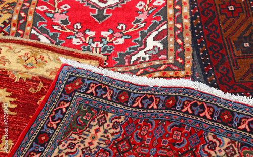 colored carpets decorated in an islamic house