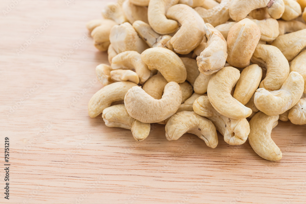 cashew on wood background cashew on wood background