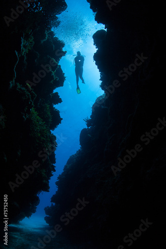 Underwater Crevice and Scuba Diver