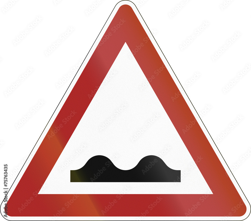 Old design (1956) of the german sign indicating speed bumps or uneven road Old design (1956) of the german sign indicating speed bumps or uneven road