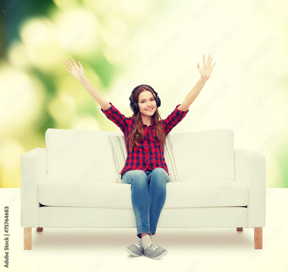 teenage girl sitting on sofa with headphones teenage girl sitting on sofa with headphones