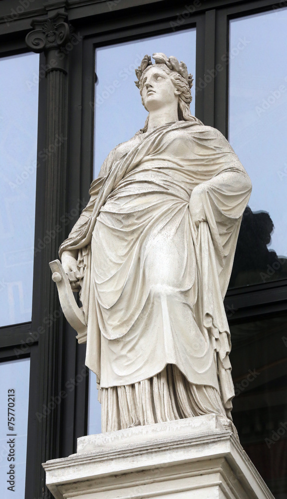 Statue on facade of Musikverein Vienna in Vienna, Austria