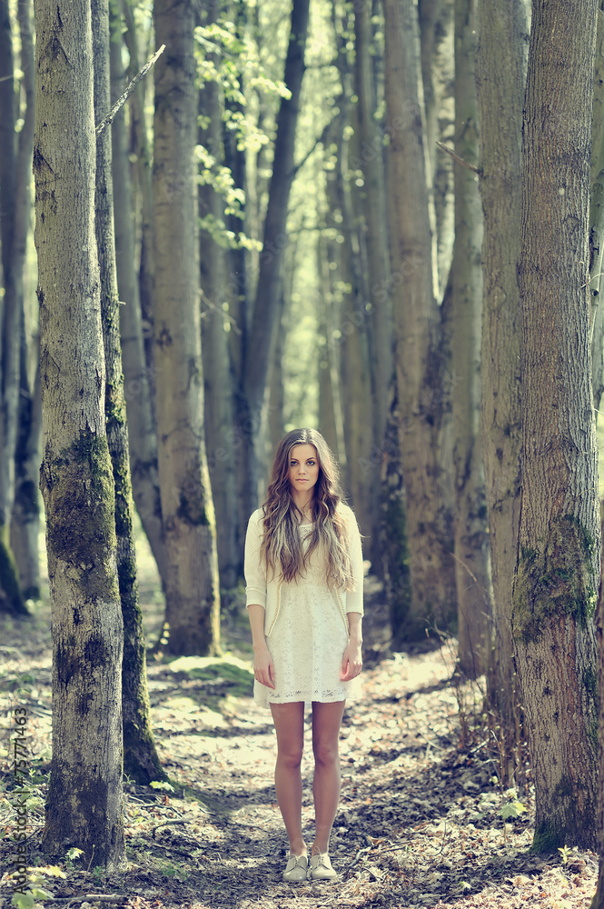 Beautiful young girl on autumn forest in dress Beautiful young girl on autumn forest in dress