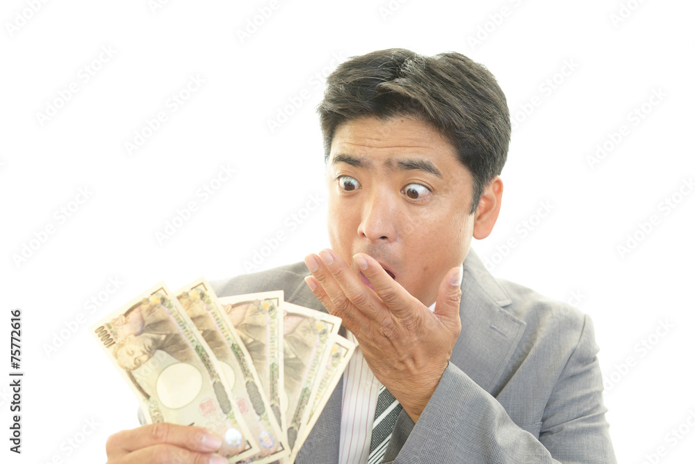 驚いた表情のビジネスマン