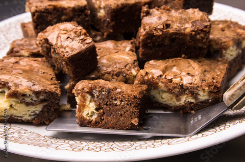 Cream cheese brownies on a plate