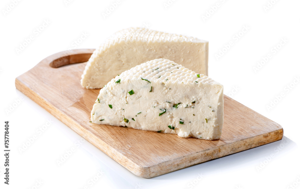 two soft cheese slabs on board isolated over white background two soft cheese slabs on board isolated over white background