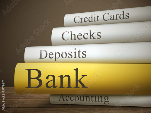 book title of bank isolated on a wooden table
