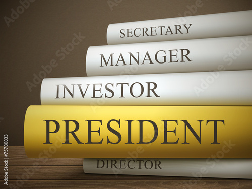 book title of president isolated on a wooden table