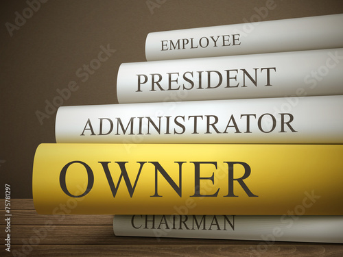 book title of owner isolated on a wooden table