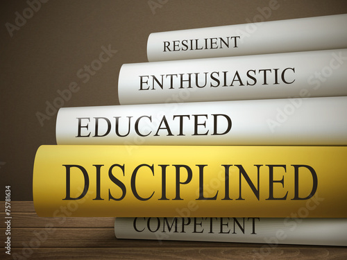 book title of disciplined isolated on a wooden table