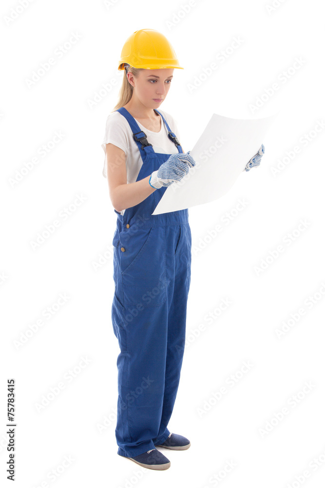 woman in blue builder uniform with building plan isolated on whi woman in blue builder uniform with building plan isolated on whi