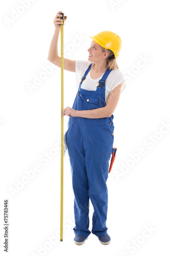 career concept - woman in blue builder uniform holding measure t