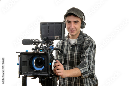 young cameraman with movie camera