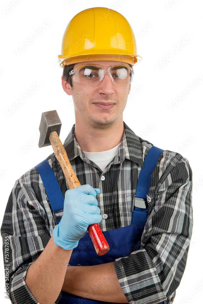 young worker with a hammer
