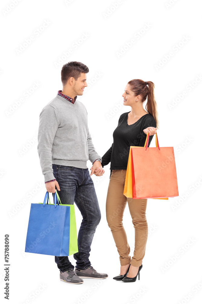 Young couple with shopping bags Young couple with shopping bags