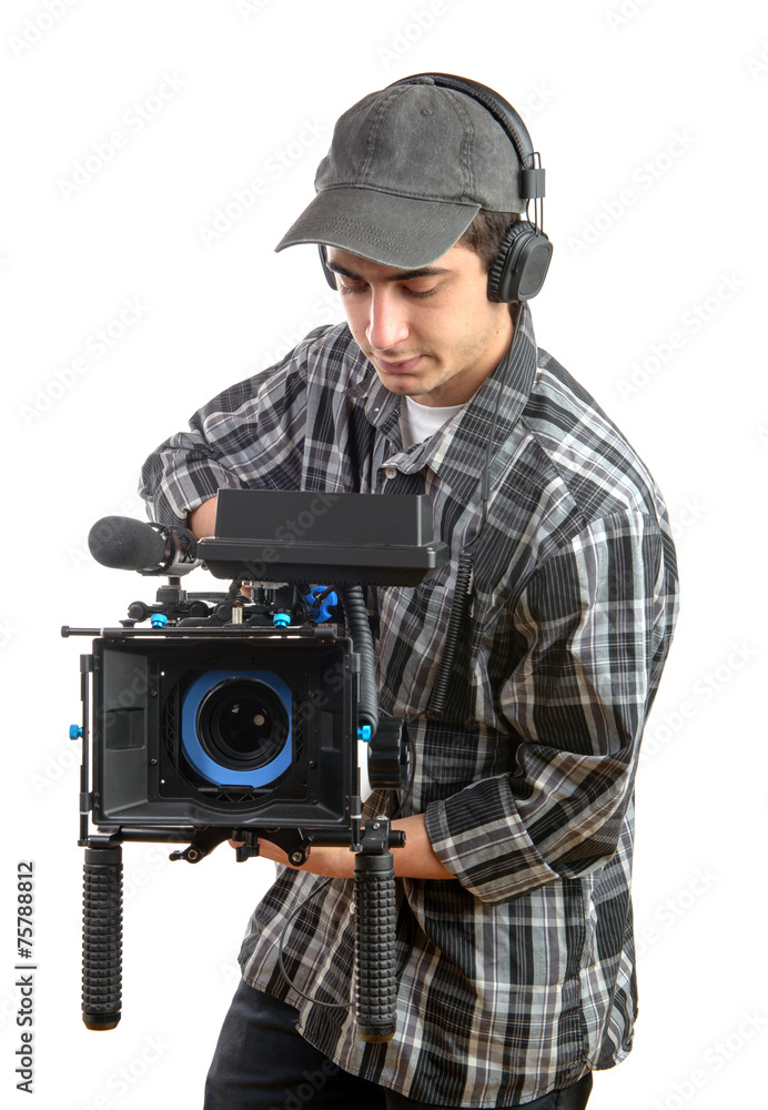 young cameraman with movie camera
