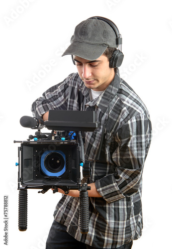 young cameraman with movie camera © Philipimage