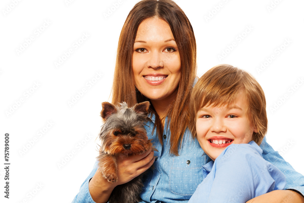 Happy mother with her son and Yorkshire Terrier Happy mother with her son and Yorkshire Terrier