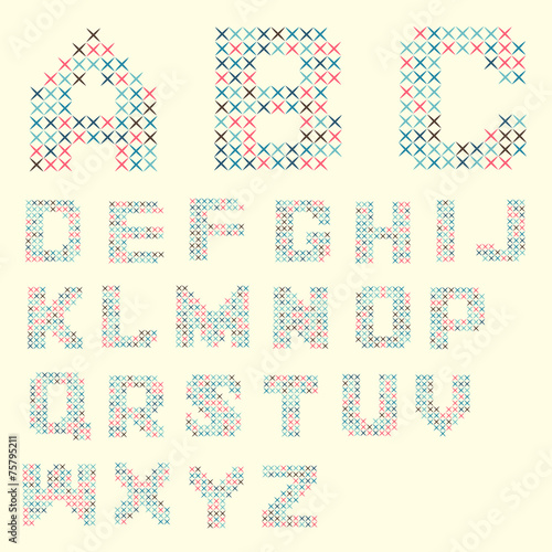 Colorful Alphabet made of cross stitches
