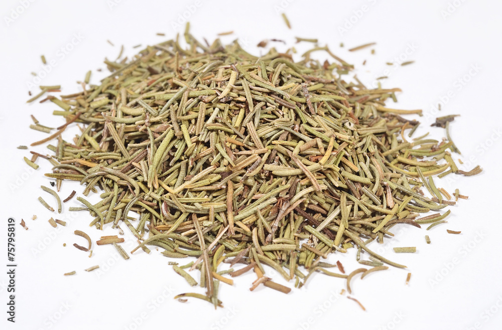 Heap of dried rosemary on a white Heap of dried rosemary on a white