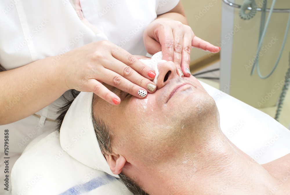 man in a beauty salon facial and massage man in a beauty salon facial and massage