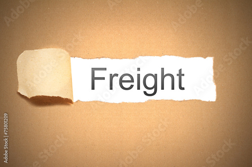 brown paper torn to reveal Freight