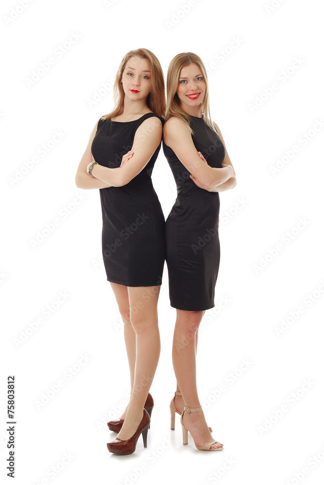 Charming colleagues posing standing back-to-back Charming colleagues posing standing back-to-back