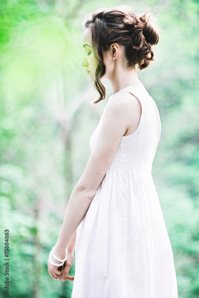 Beautiful young woman in the forest Beautiful young woman in the forest
