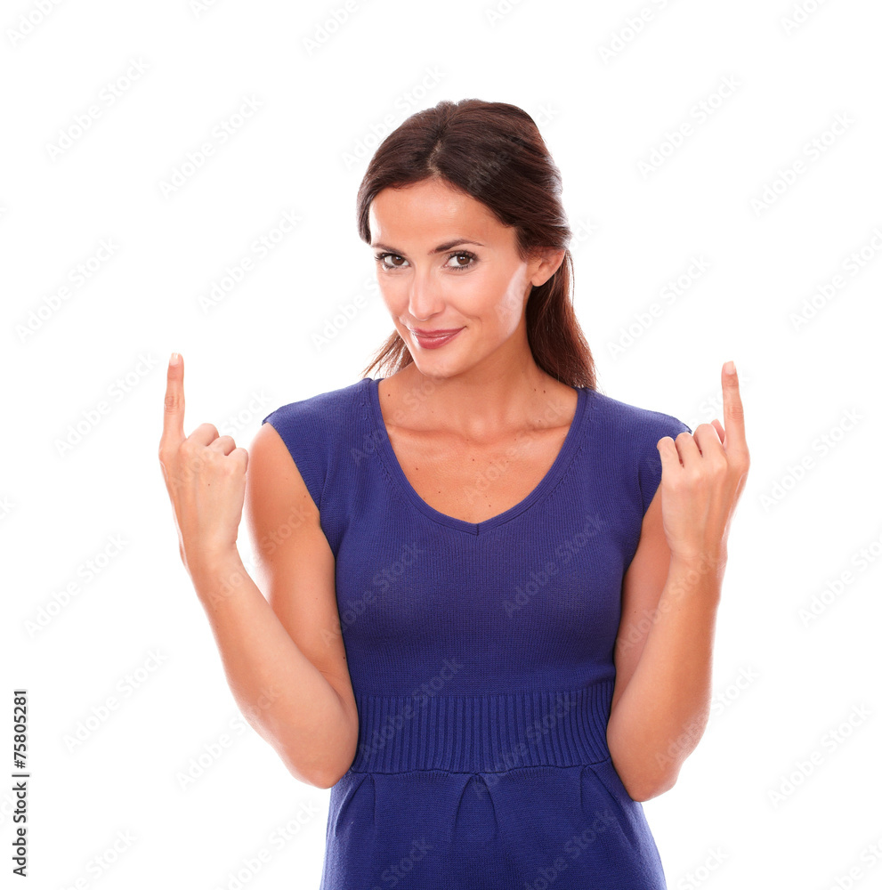 Fashionable girl in purple dress pointing up Fashionable girl in purple dress pointing up