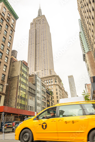 NEW YORK CITY - JUNE 12, 2013: Taxi cab in city street. The are © jovannig