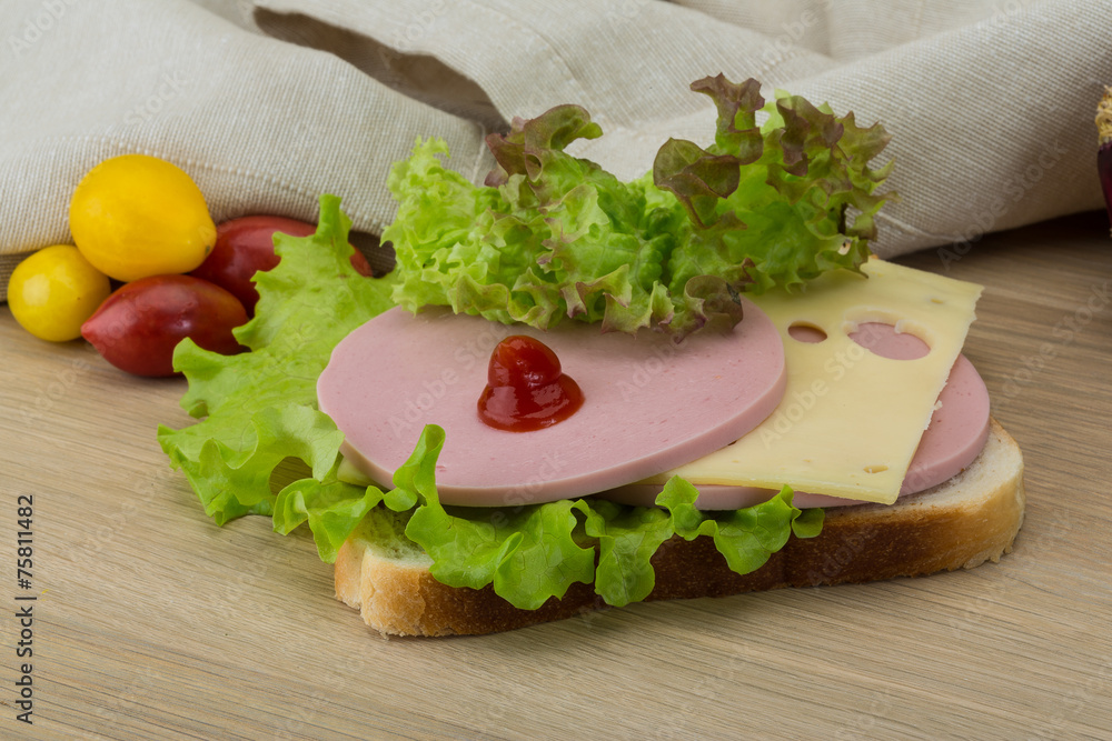 Sandwich with cheese and sausages Sandwich with cheese and sausages