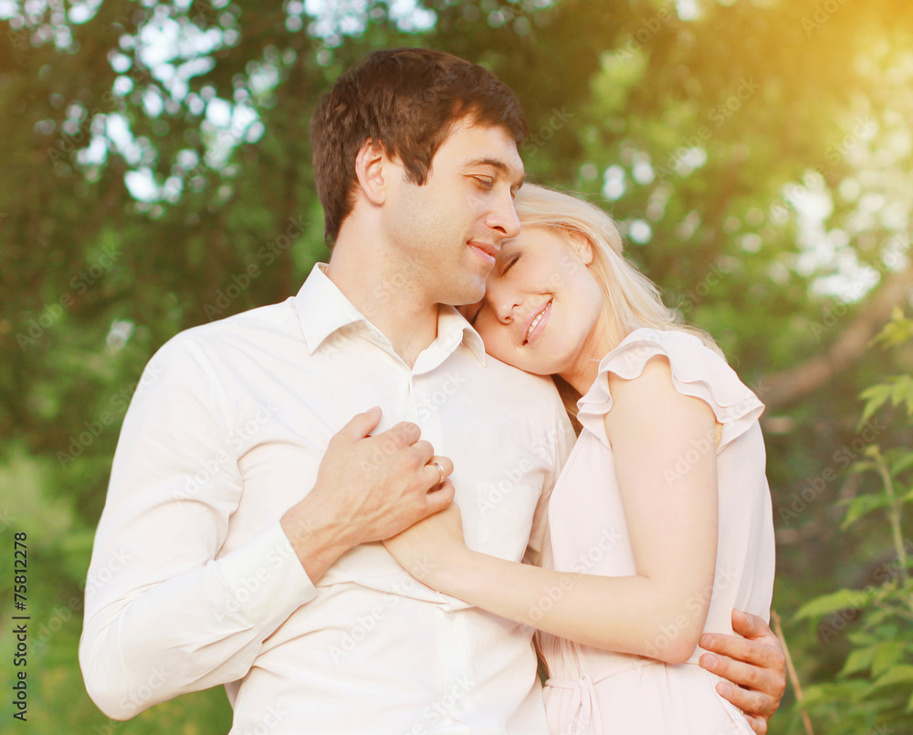 Fototapeta premium Romantic young couple in love outdoors, warm tender feelings