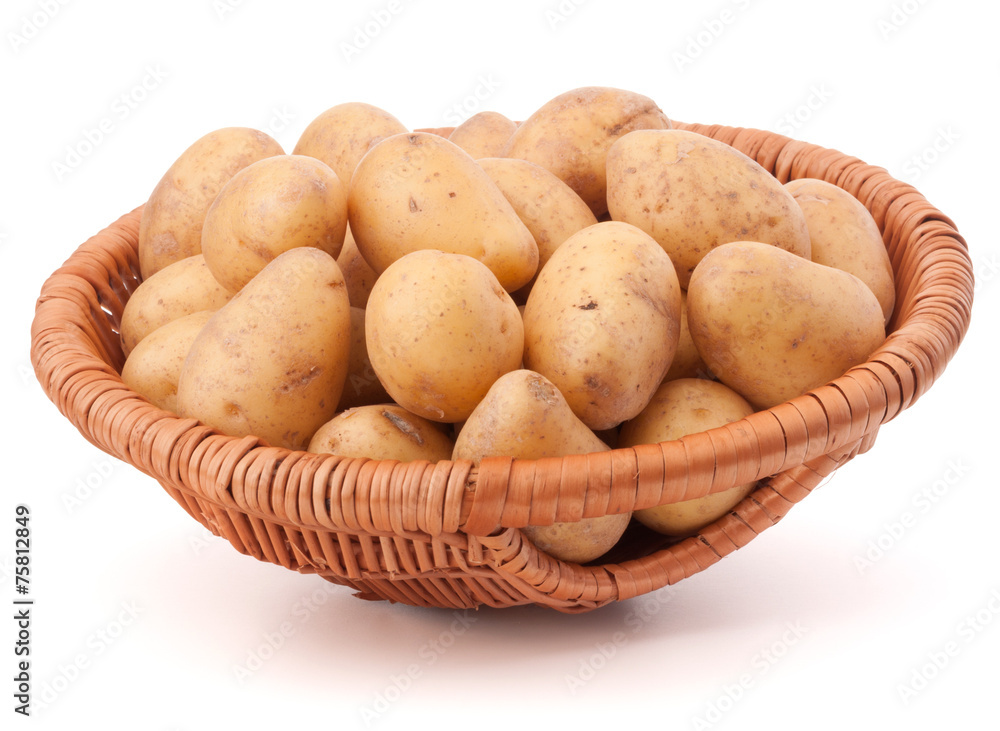 Potato tuber in wicker basket isolated on white background Potato tuber in wicker basket isolated on white background