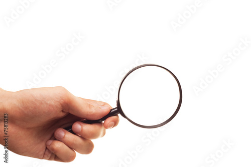 hand with magnifying glass isolated on white background