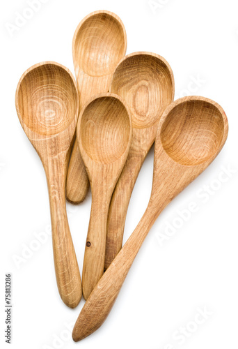 Carving wooden spoon isolated on white background cutout photo