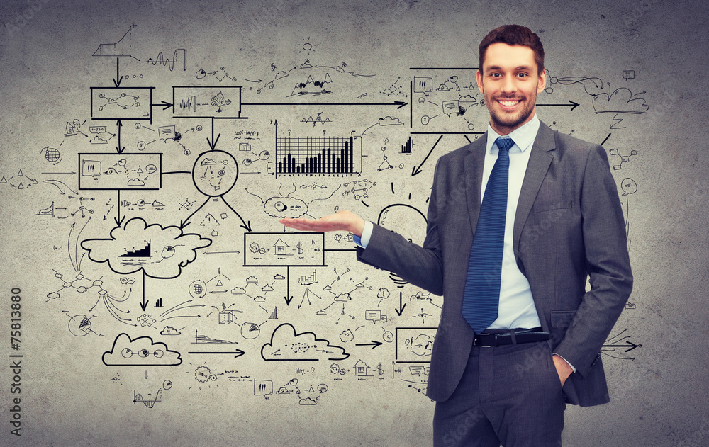 man showing something big plan on concrete wall man showing something big plan on concrete wall