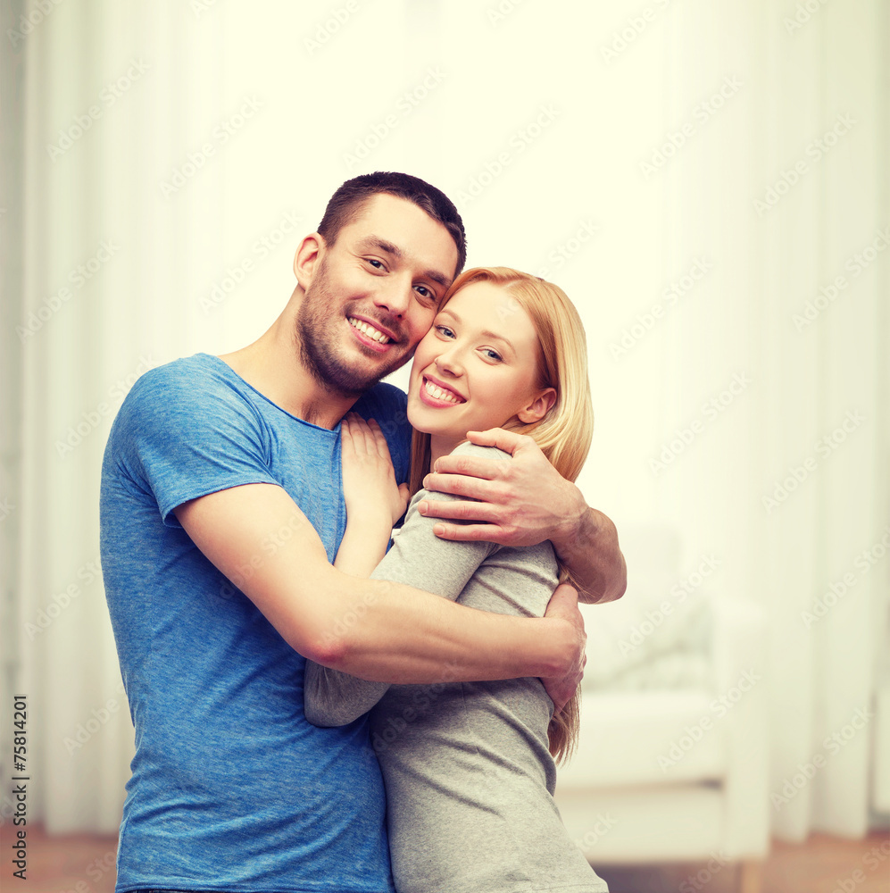 Fototapeta premium smiling couple hugging