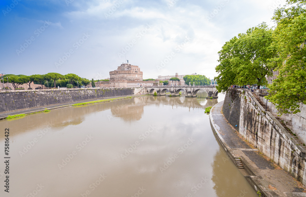 Fototapeta premium Along Tiber river, Rome. St Angel Castle in background