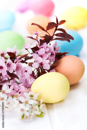 Easter eggs and peach flowers