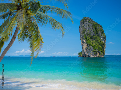 Clear water and blue sky. Beach in Krabi province.