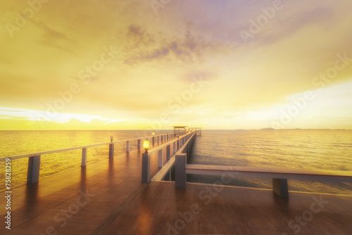 Landscape of Wooded bridge in the port between sunrise