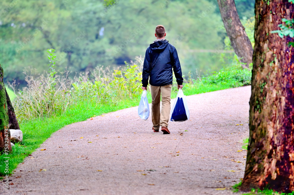 Fototapeta premium Man walking in the park