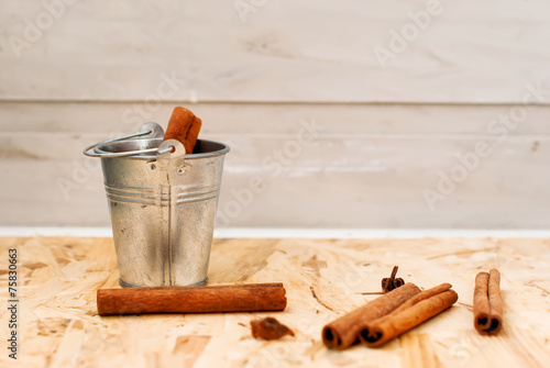 cinnamon sticks in a bucket photo
