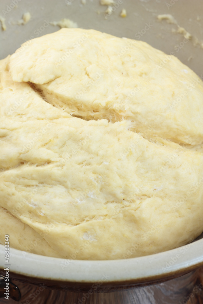 Bowl full of dough ready for rolling. Bowl full of dough ready for rolling.